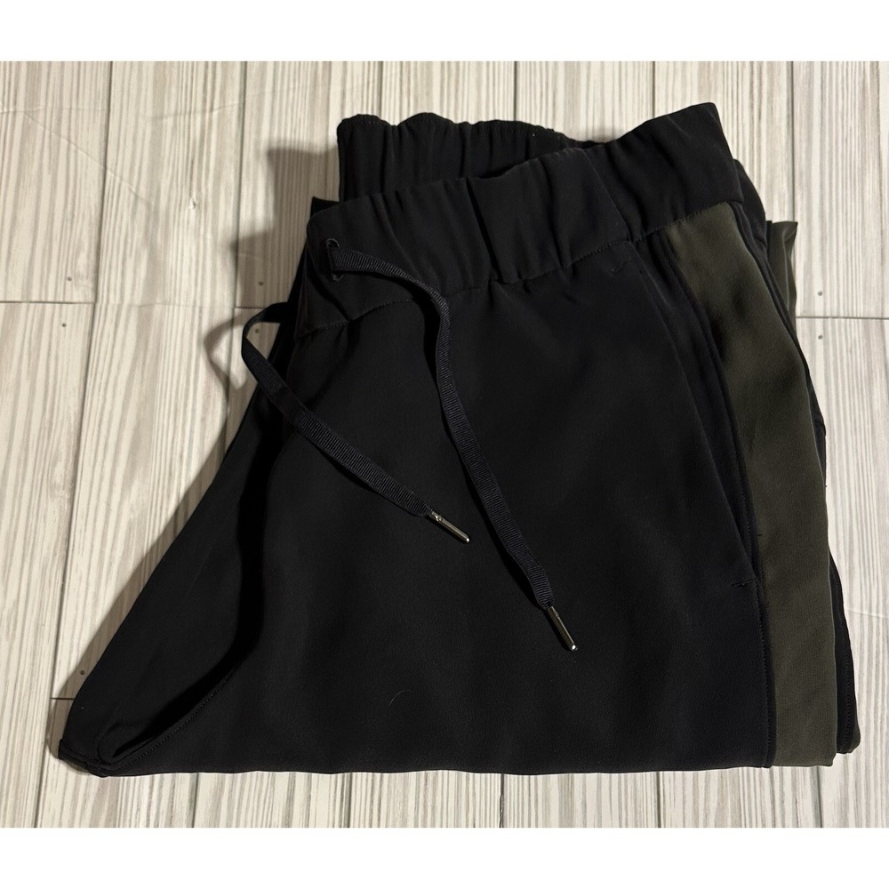 LULULEMON On The Fly 7/8 Pant Womens Size 10 Drawstring‎ Black And Olive Green